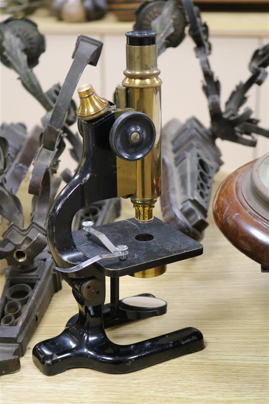 A lacquered brass microscope by Seibert Wetzlar, cased